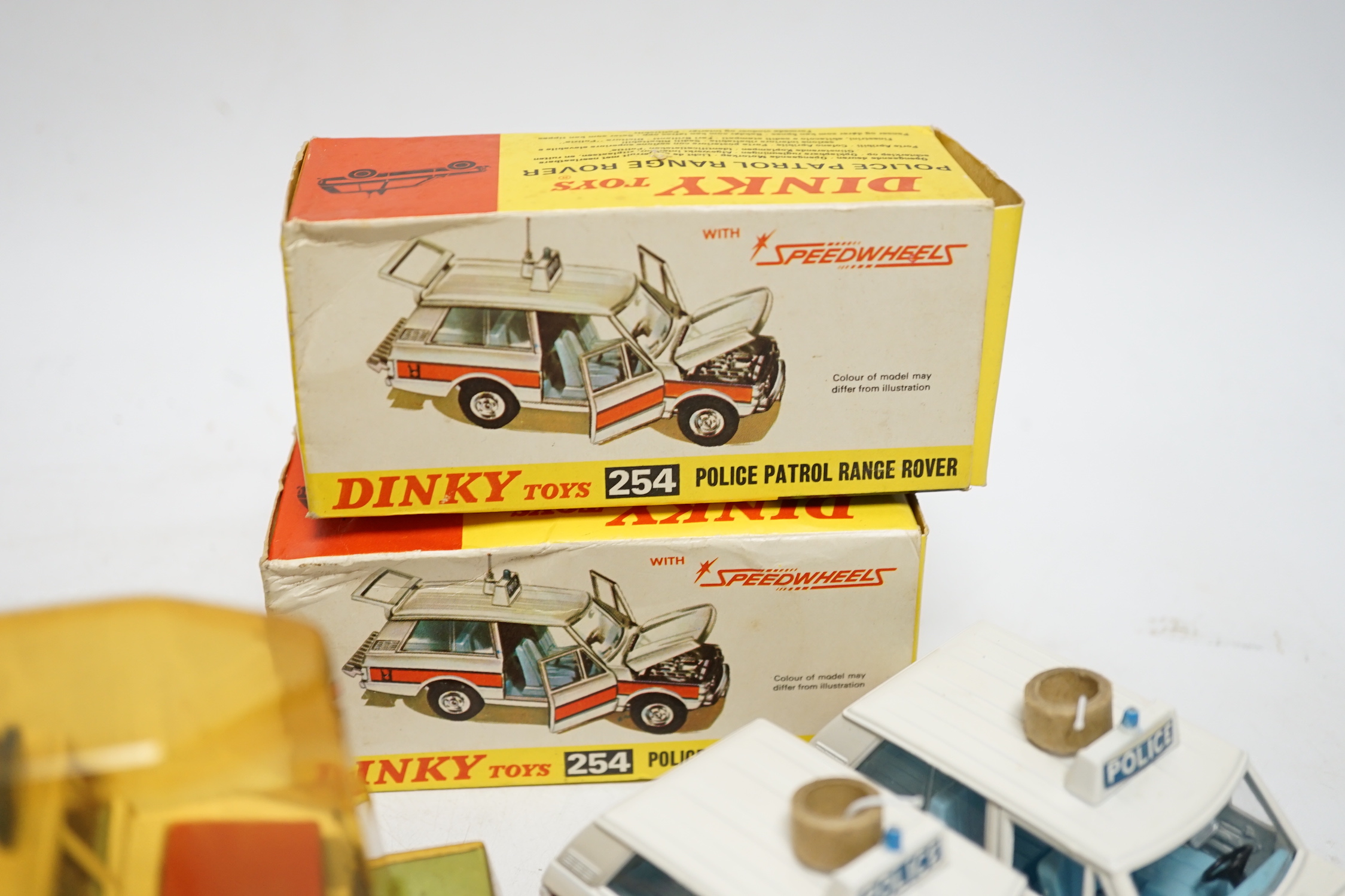 Five boxed Dinky Toys; Rover 75 Saloon (156) in correct two-tone green colour spot box, two Police Patrol Range Rover (254) and two Land Rover Breakdown Crane (442)